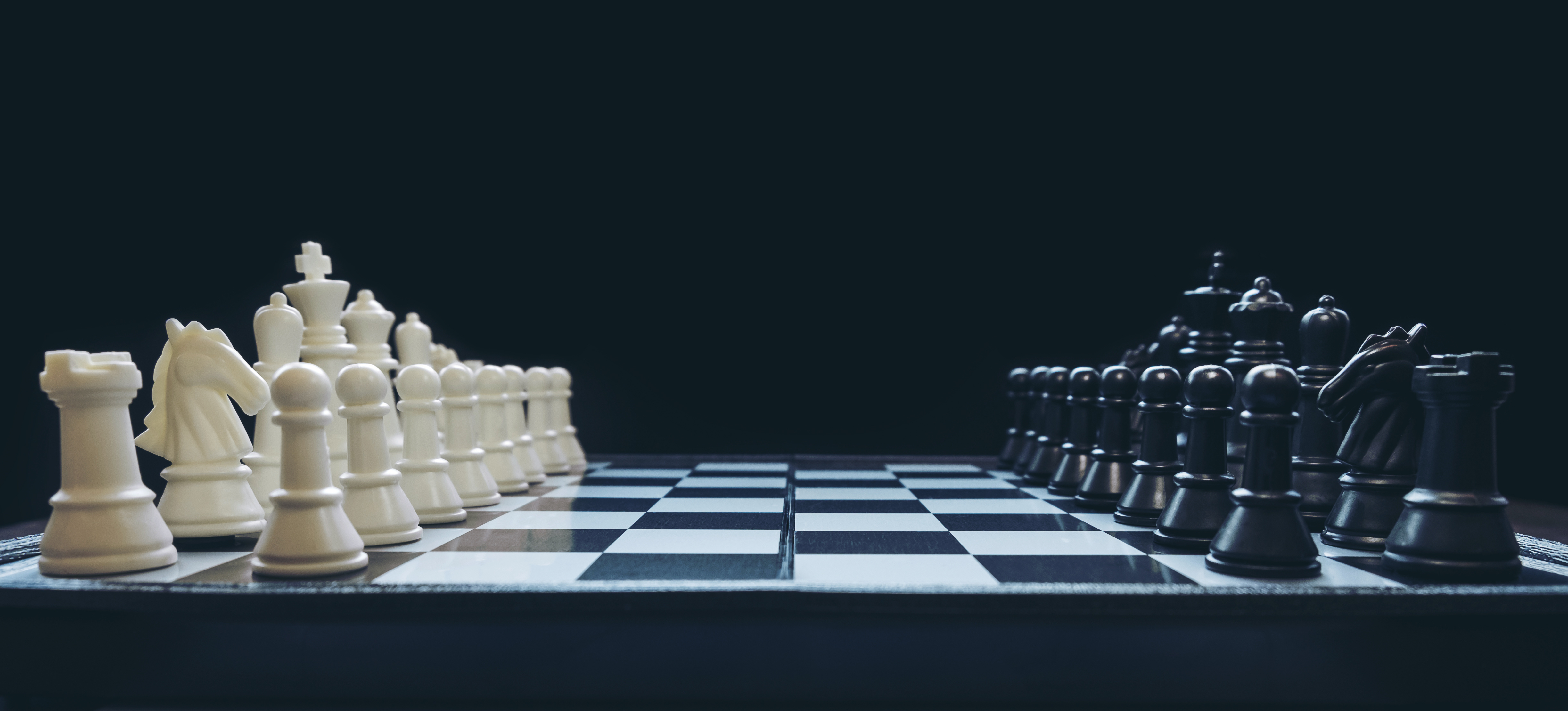 Strategic chess backdrop representing QA planning and release readiness